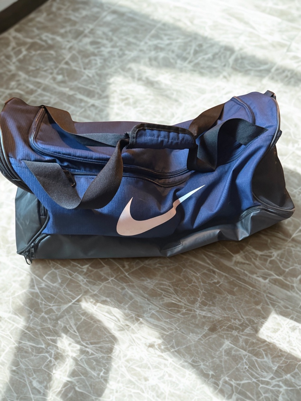Nike Blue Duffel Bag with White Swoosh